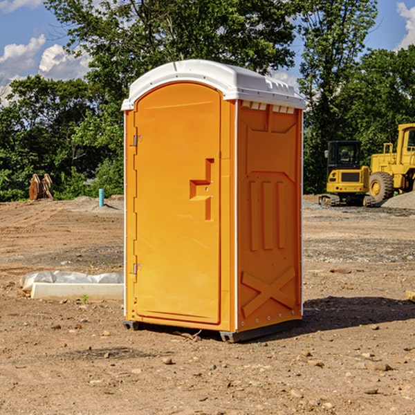 how often are the porta potties cleaned and serviced during a rental period in Whitaker